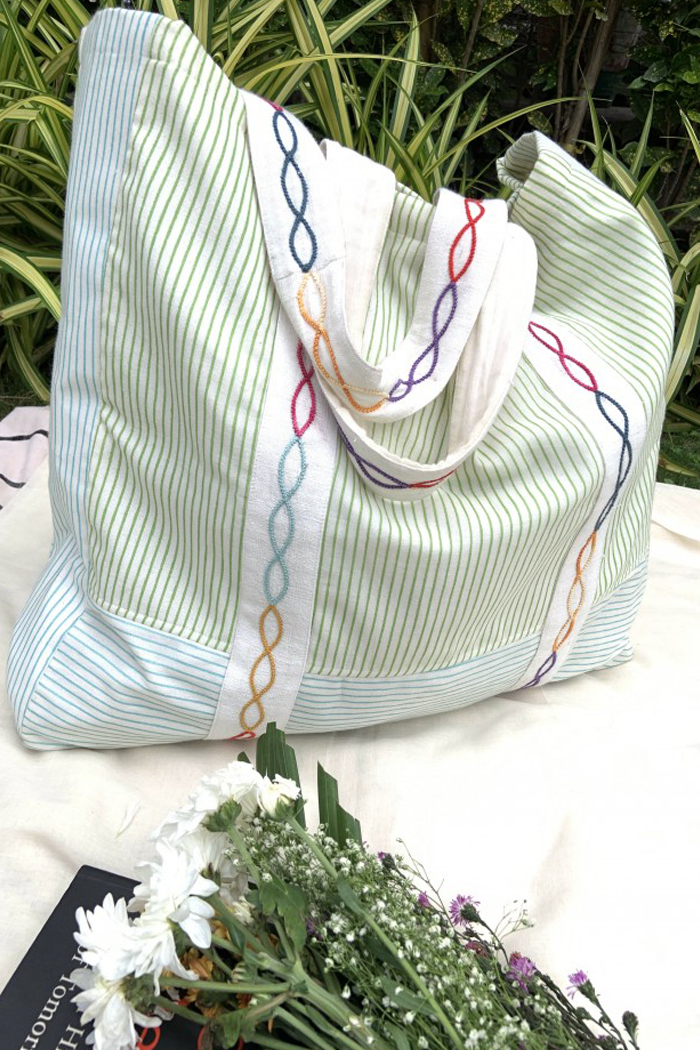Striped handloom cotton hand embroidered bag