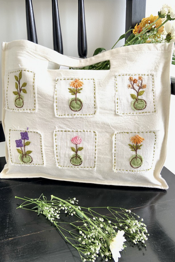 White handloom cotton hand embroidered bag