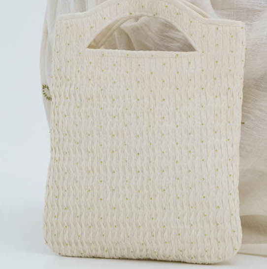 White handloom cotton smocked beaded bag