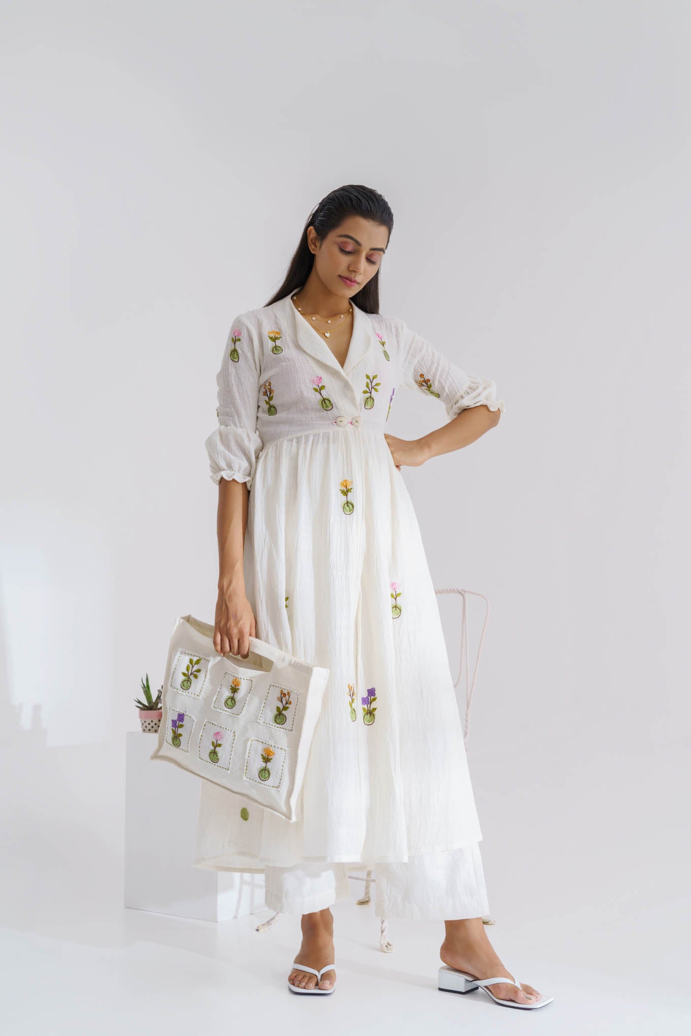 White handloom cotton hand embroidered bag