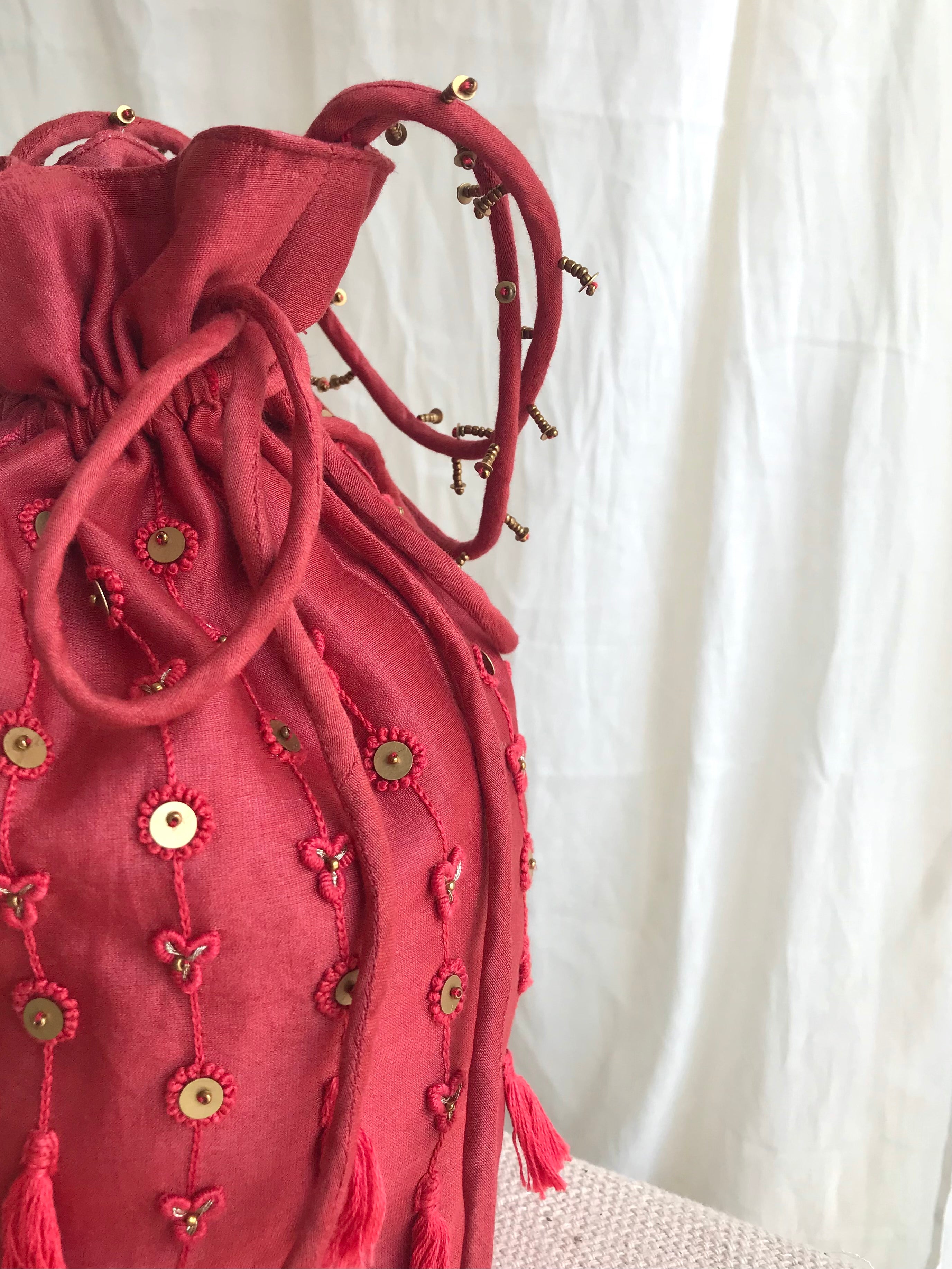 Red chanderi silk hand embroidered potli bag