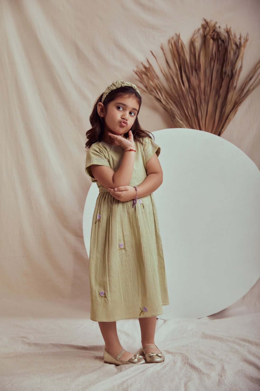 Green linen hand embroidered pleated dress
