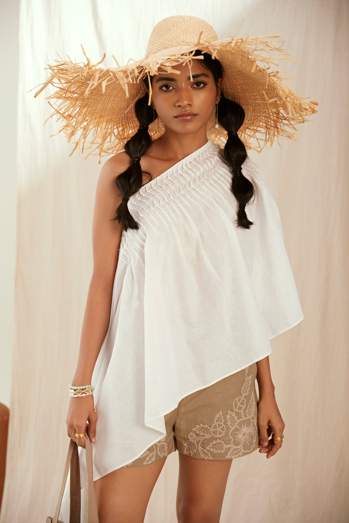 White cotton top with beige linen hand embroidered shorts