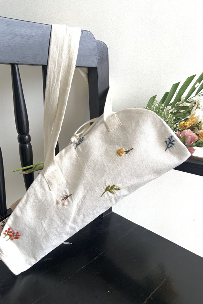 White handloom cotton hand embroidered bag