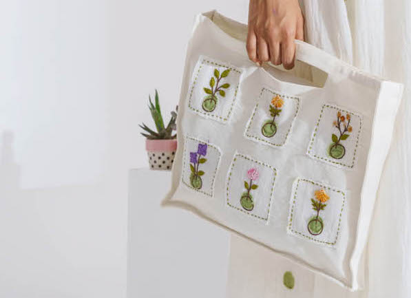 White handloom cotton hand embroidered bag